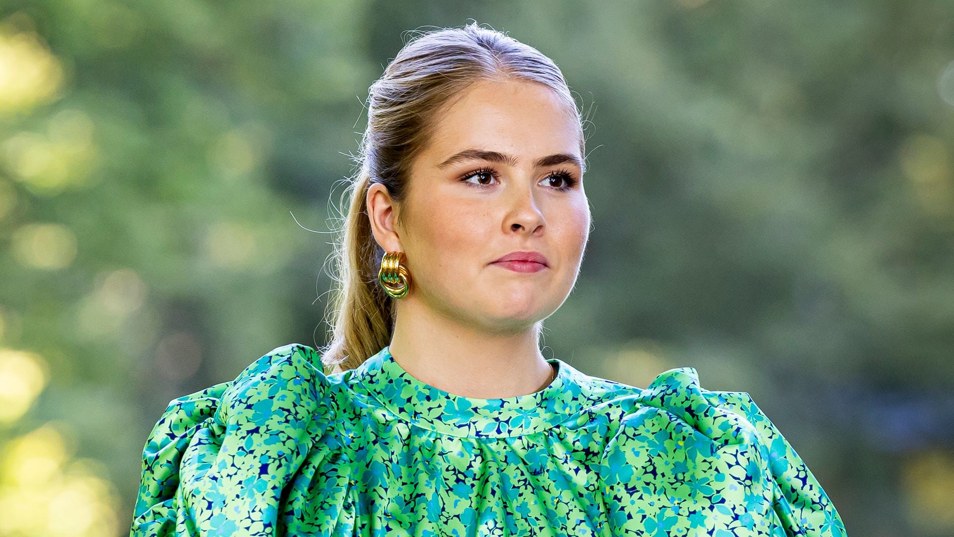 Princess Catharina Amalia wearing green top and white trousers