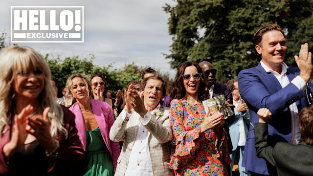 Ronnie and Sally Wood cheer at Tyrone Wood and Faye Harris' wedding