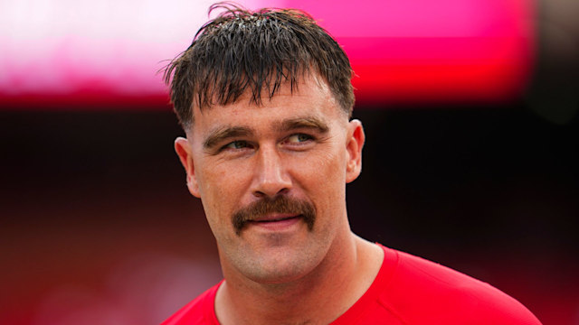 Travis Kelce #87 of the Kansas City Chiefs warms up prior to an NFL football game against the Baltimore Ravens at GEHA Field at Arrowhead Stadium in 2024 