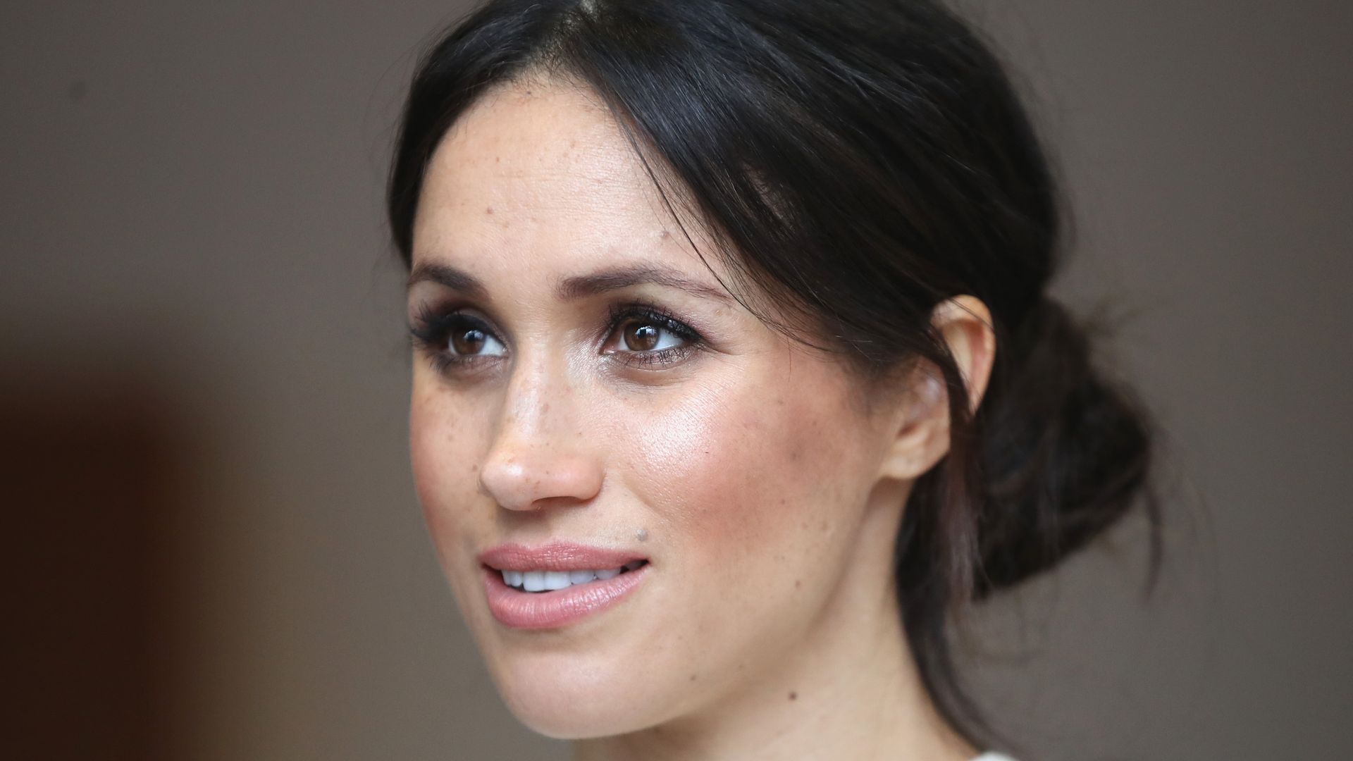 Meghan Markle has never looked better in daring halterneck outfit as ...
