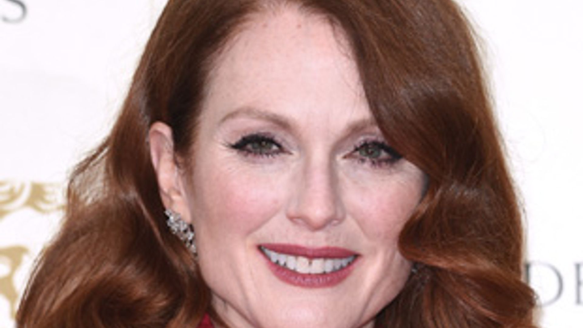 Non-Stop on the move. Actress Julianne Moore traveling with her