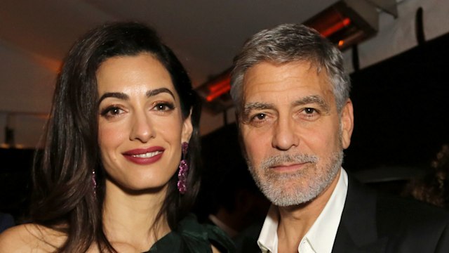 \Amal Clooney and George Clooney attends the premiere of Hulu's "Catch-22" on May 07, 2019 in Hollywood, California.\\