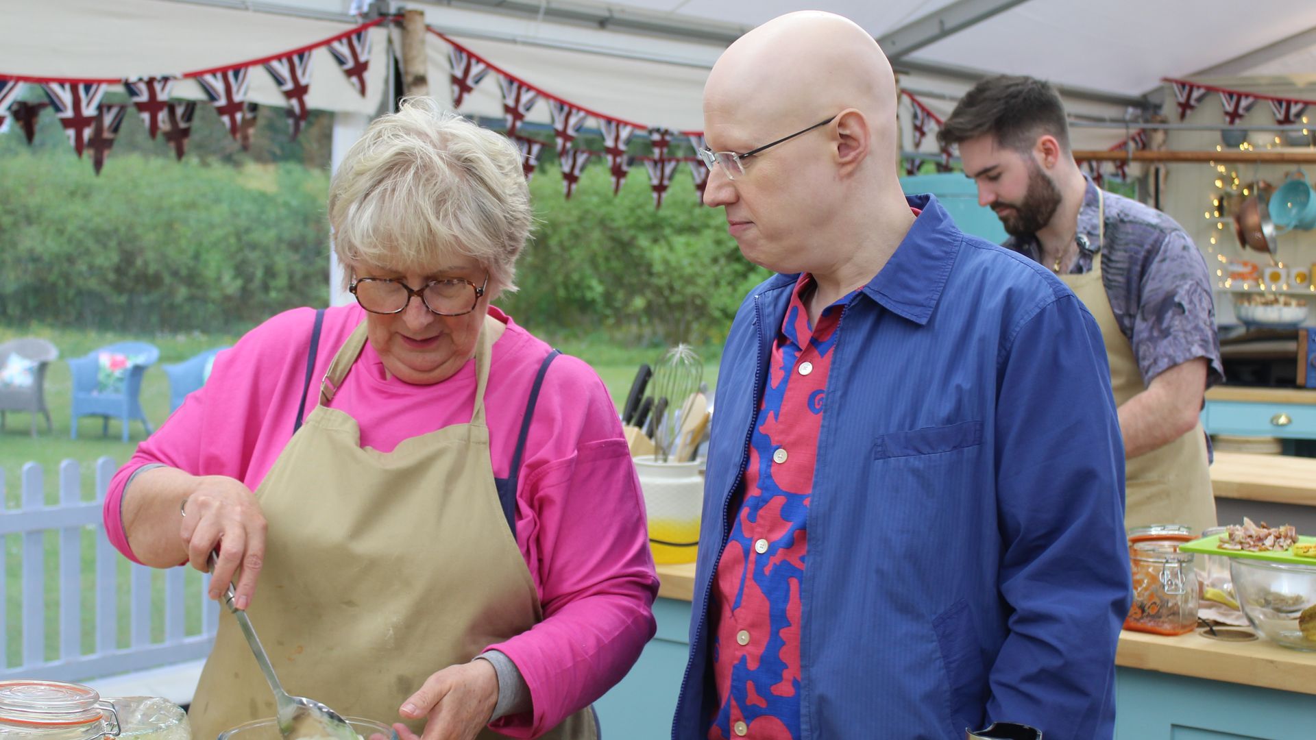 Matt on The Great British Bake Off with contestant Dawn as she bakes