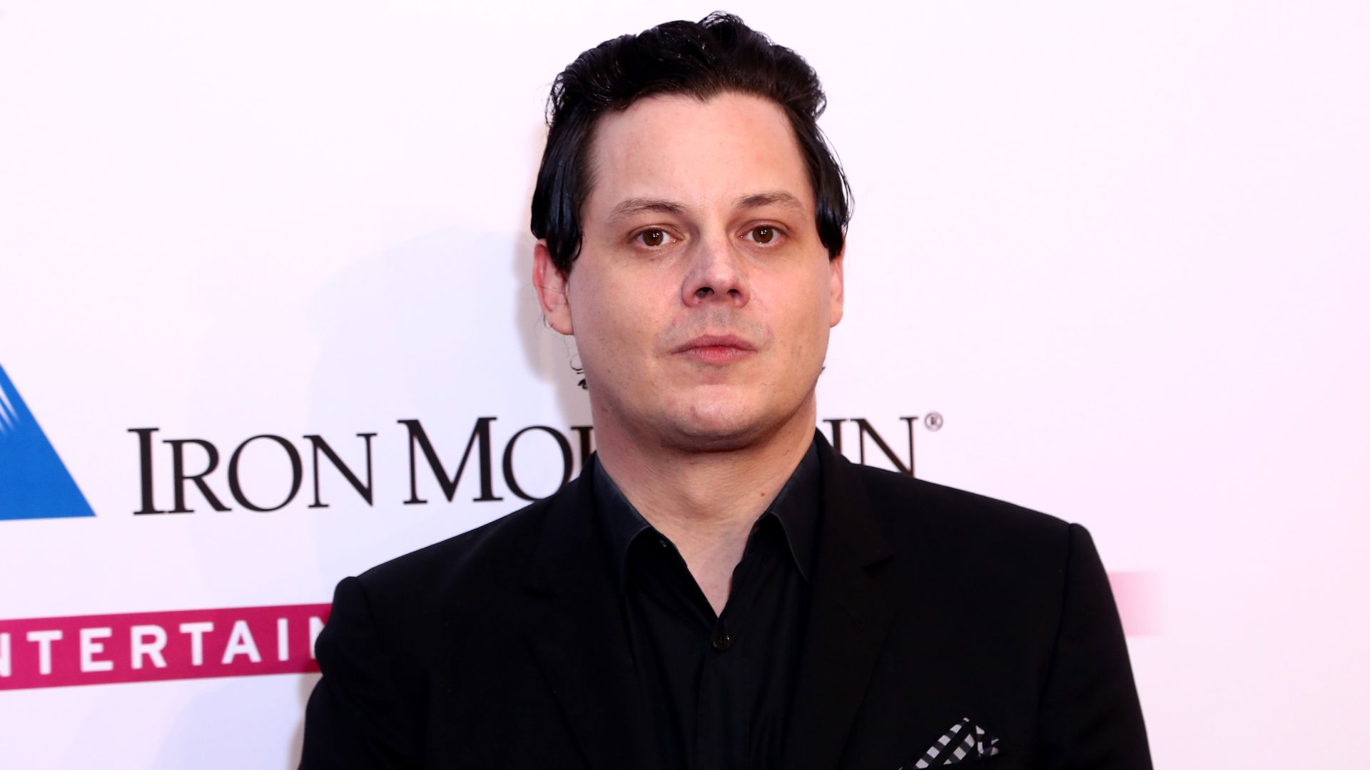 Jack White in a black suit