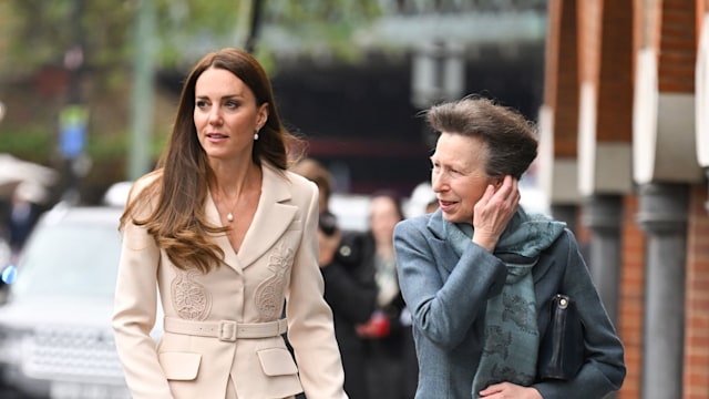 Princess Anne and Princess Kate walking along the pavement together