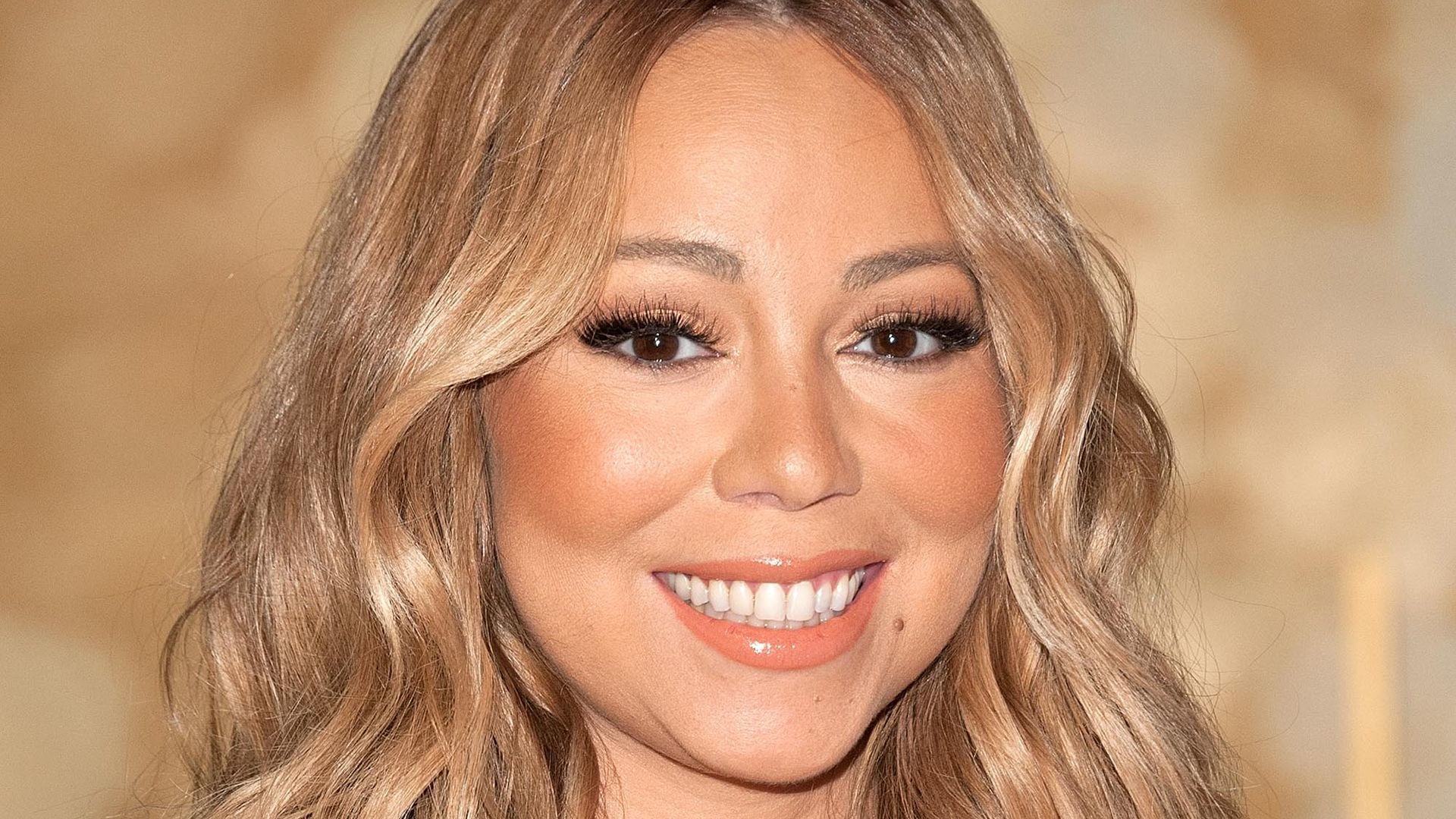 Close up of Mariah Carey smiling 