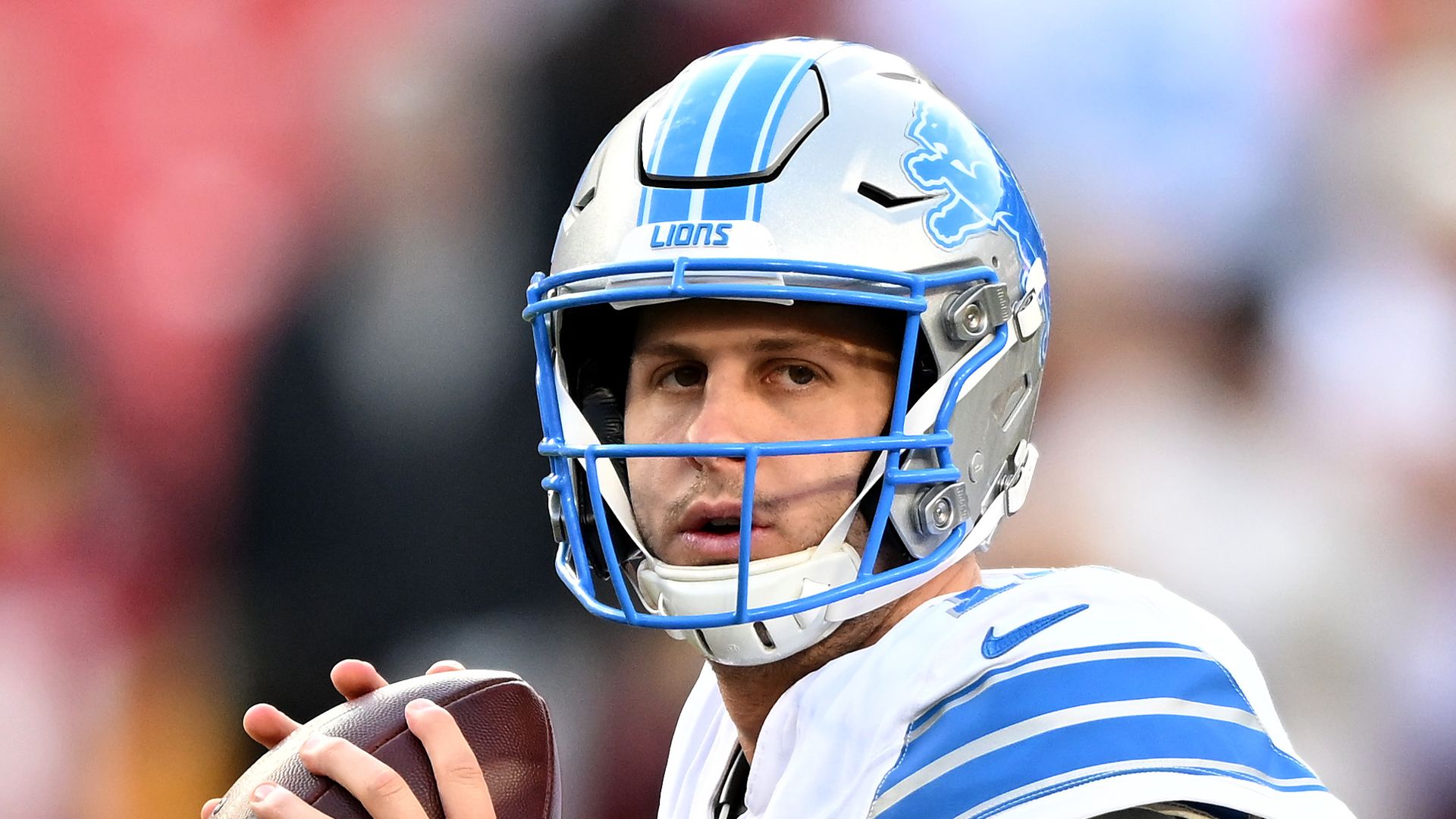 Jared Goff warms up before the game against the Washington Commanders