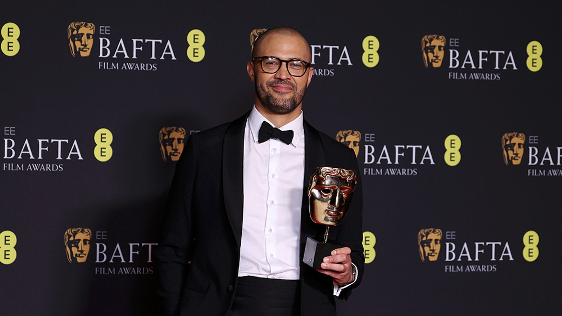Cord Jefferson poses with his BAFTA for Best Adapted Screenplay