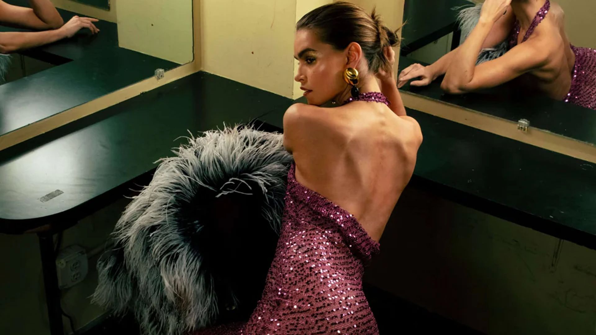 purple sequin dress worn by model