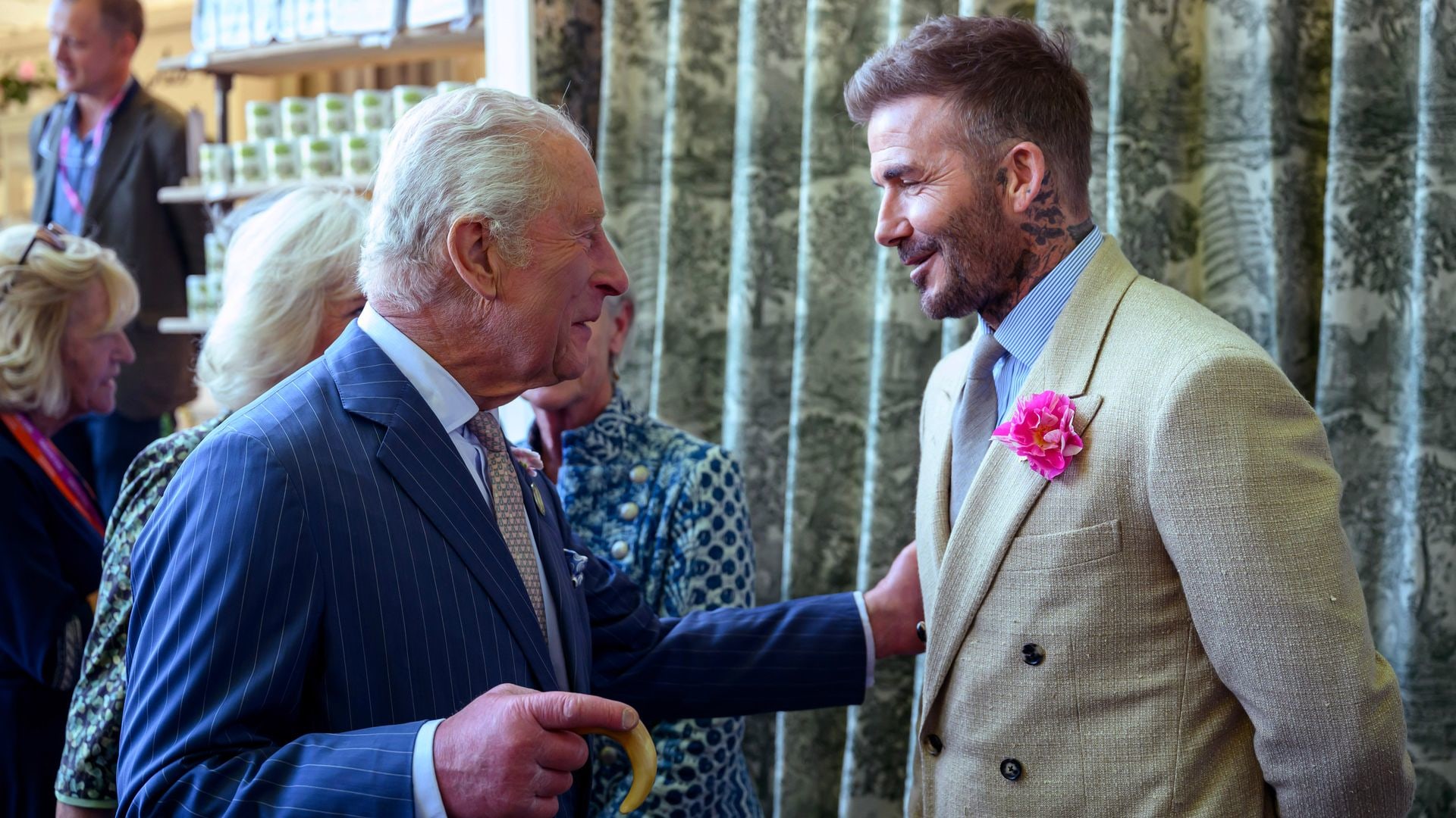 King Charles talking to David Beckham