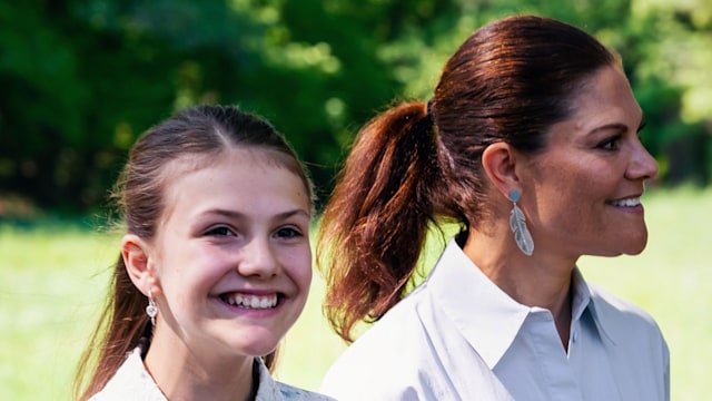 Crown Princess Victoria and Princess Estelle walking hand in hand