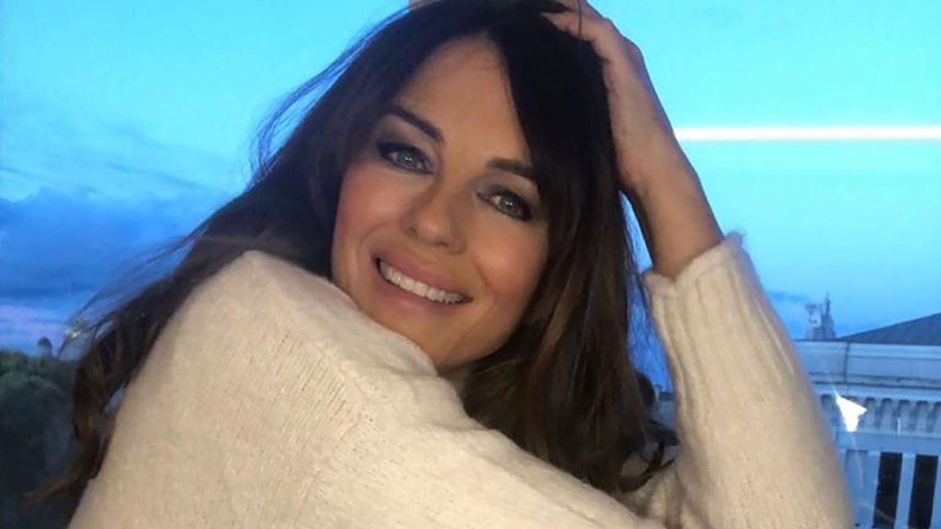 Elizabeth Hurley, 55, poses in just a jumper – and looks stunning