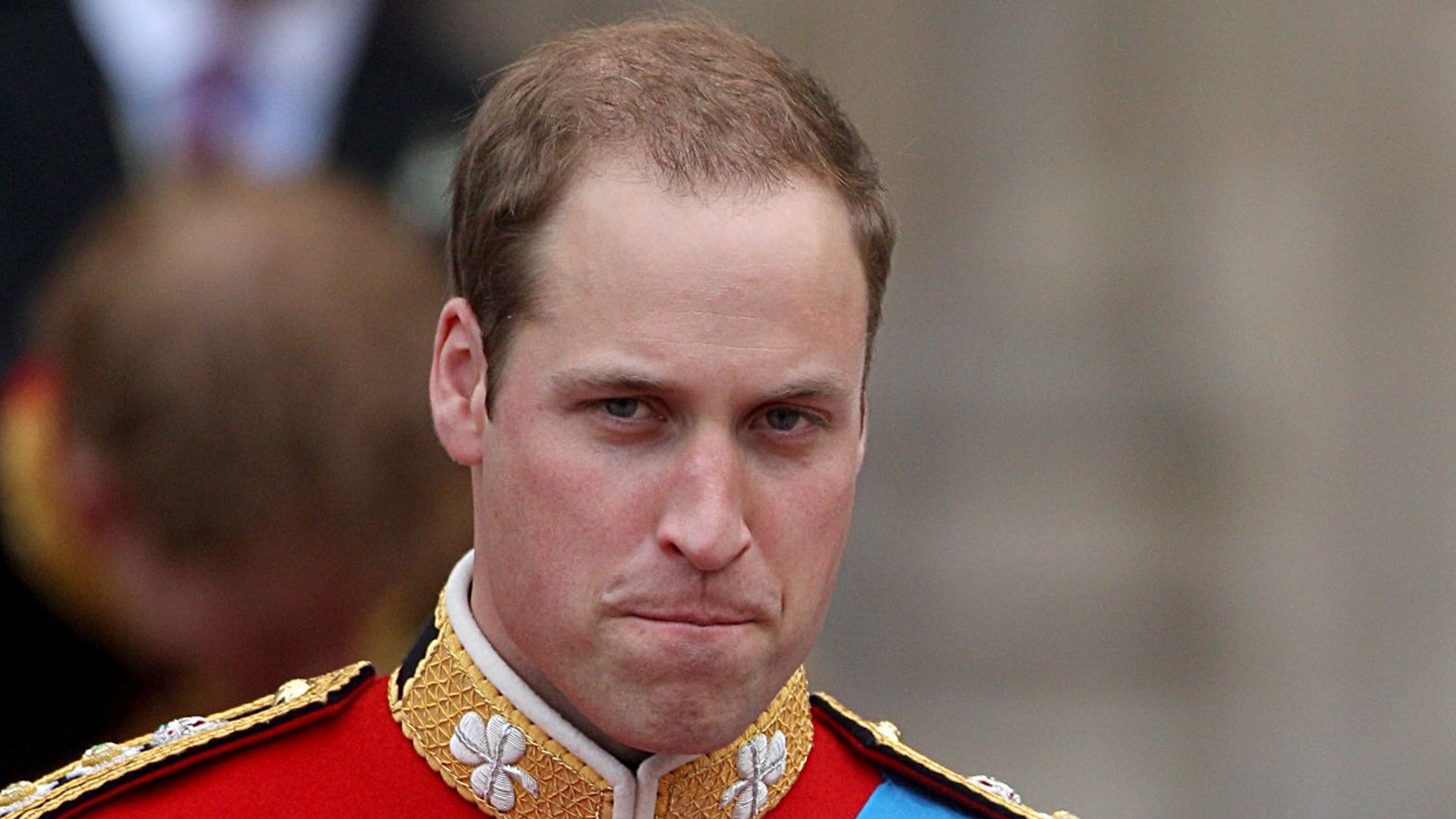 kate middleton in wedding dress and prince william in military dress