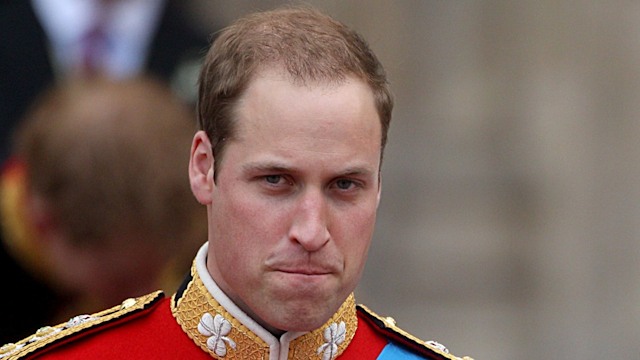 kate middleton in wedding dress and prince william in military dress
