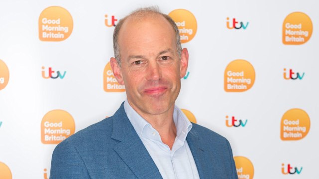 Phil Spencer in a blue suit