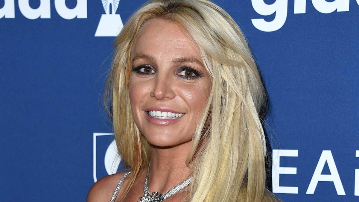 Britney Spears stuns in neon swimsuit and pink hair transformation ...