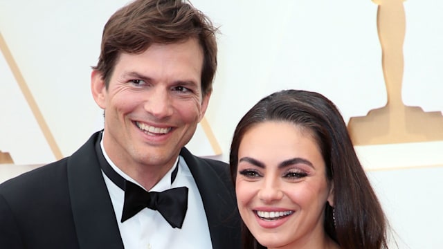 Ashton Kutcher and Mila Kunis attend the 94th Annual Academy Awards