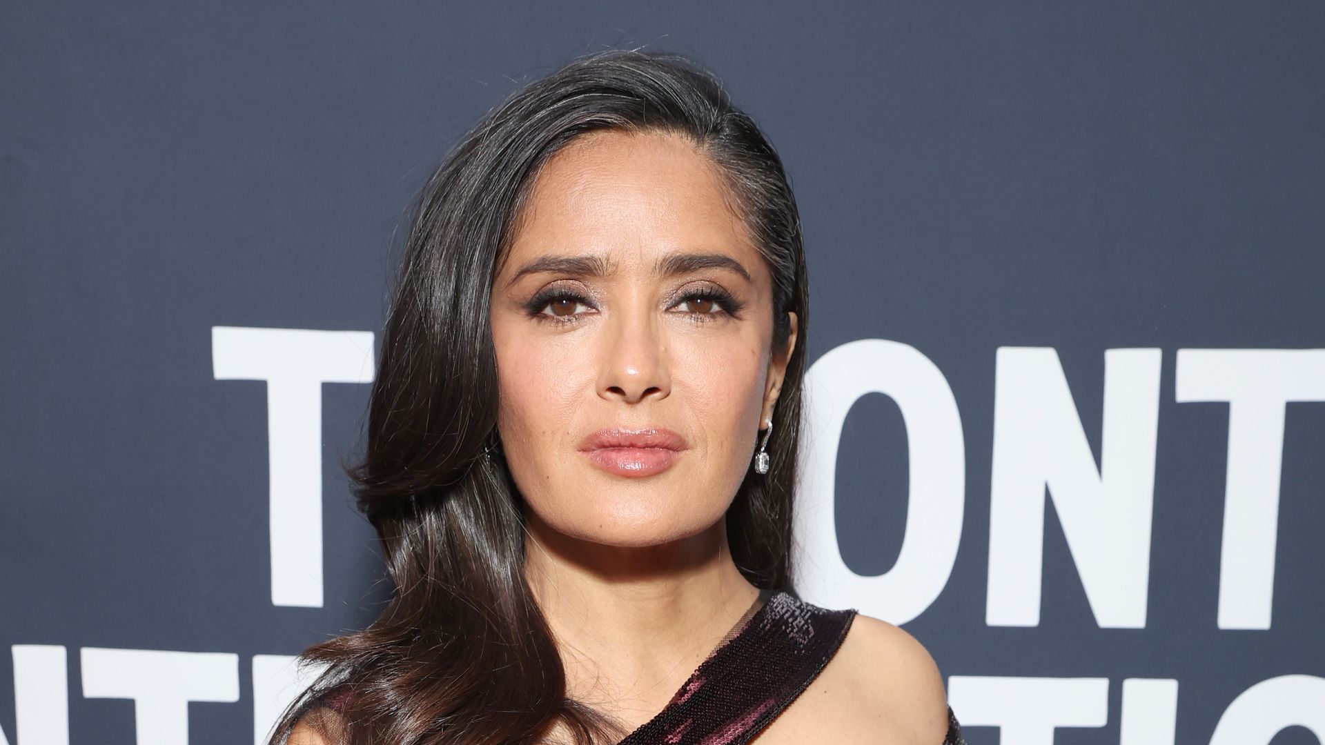 Salma Hayek's show-stopping trio of waist-cinching dresses steal the show at latest TIFF appearance