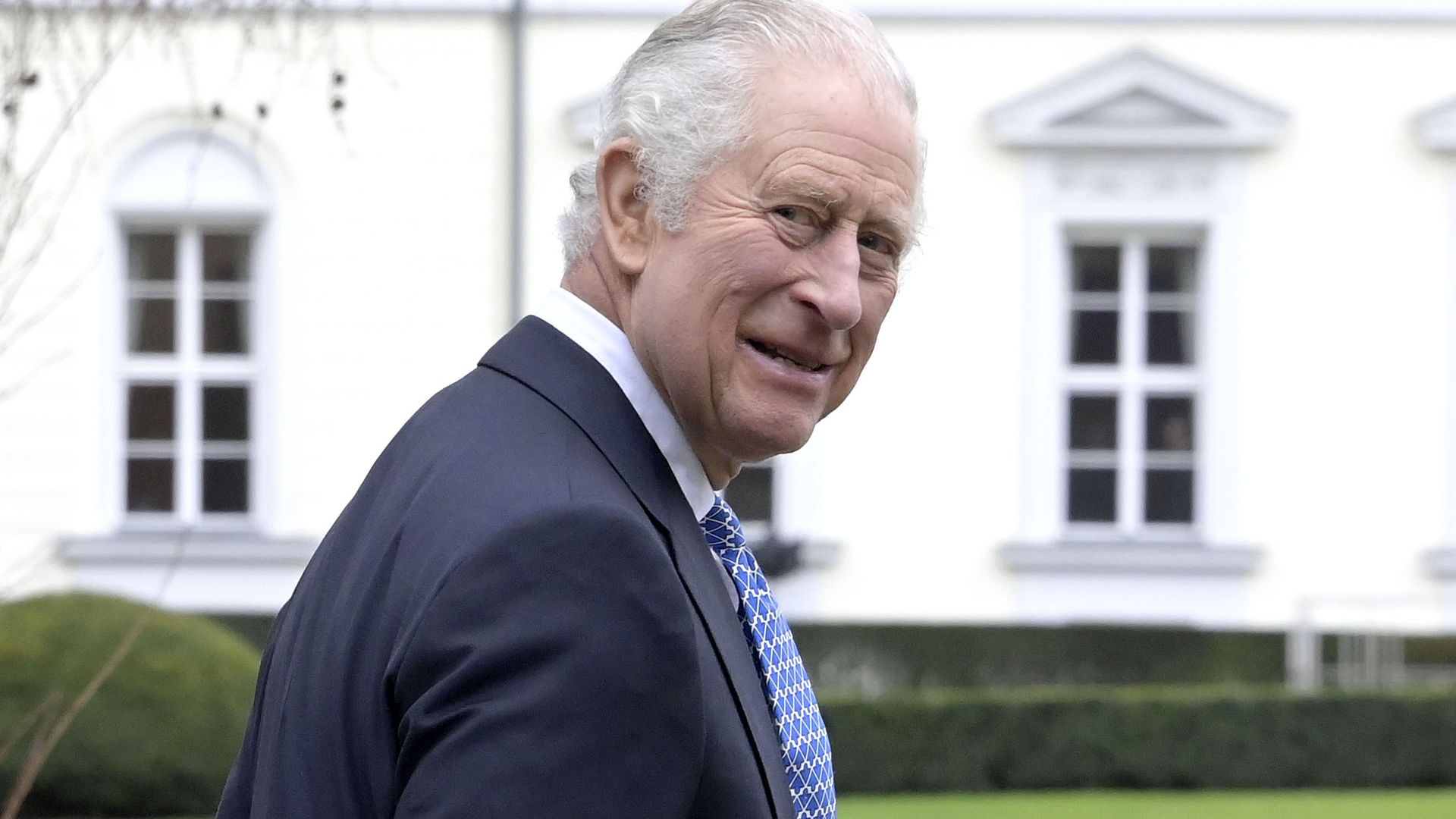 King Charles looks 'so well' as he opens doors to floral-covered home with Queen Camilla