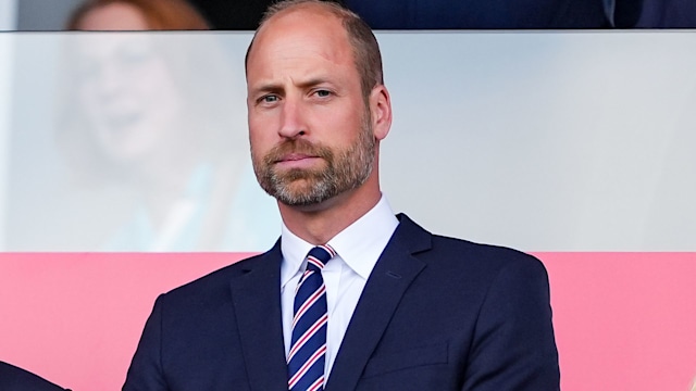Prince William with a blank expression on his face