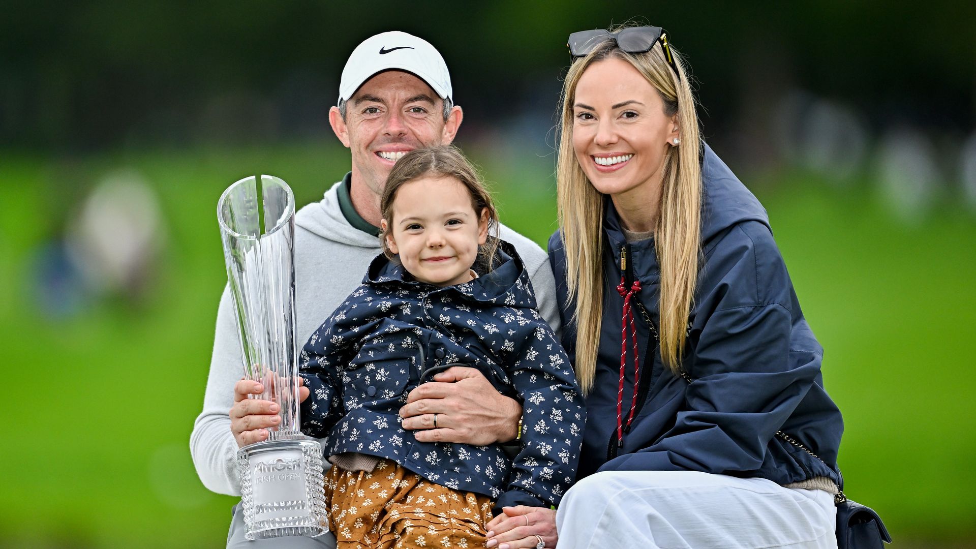 ; Rory McIlroy celebrates with his wife Erica Stoll and their daughter Poppy after winning the Amgen Irish Open Golf Championship 2025 at The K Club