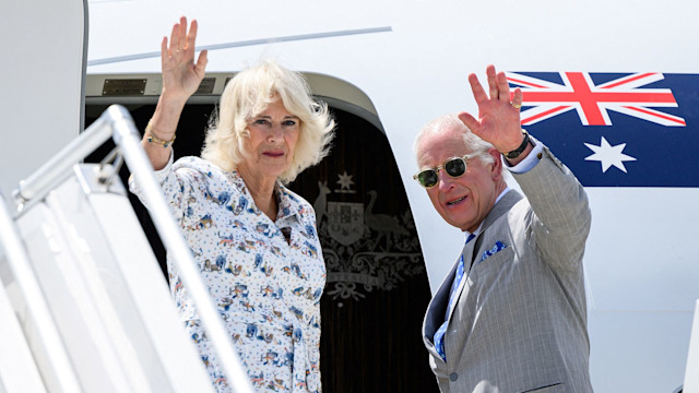 Charles and Camilla waving from plane at Sydney airport 