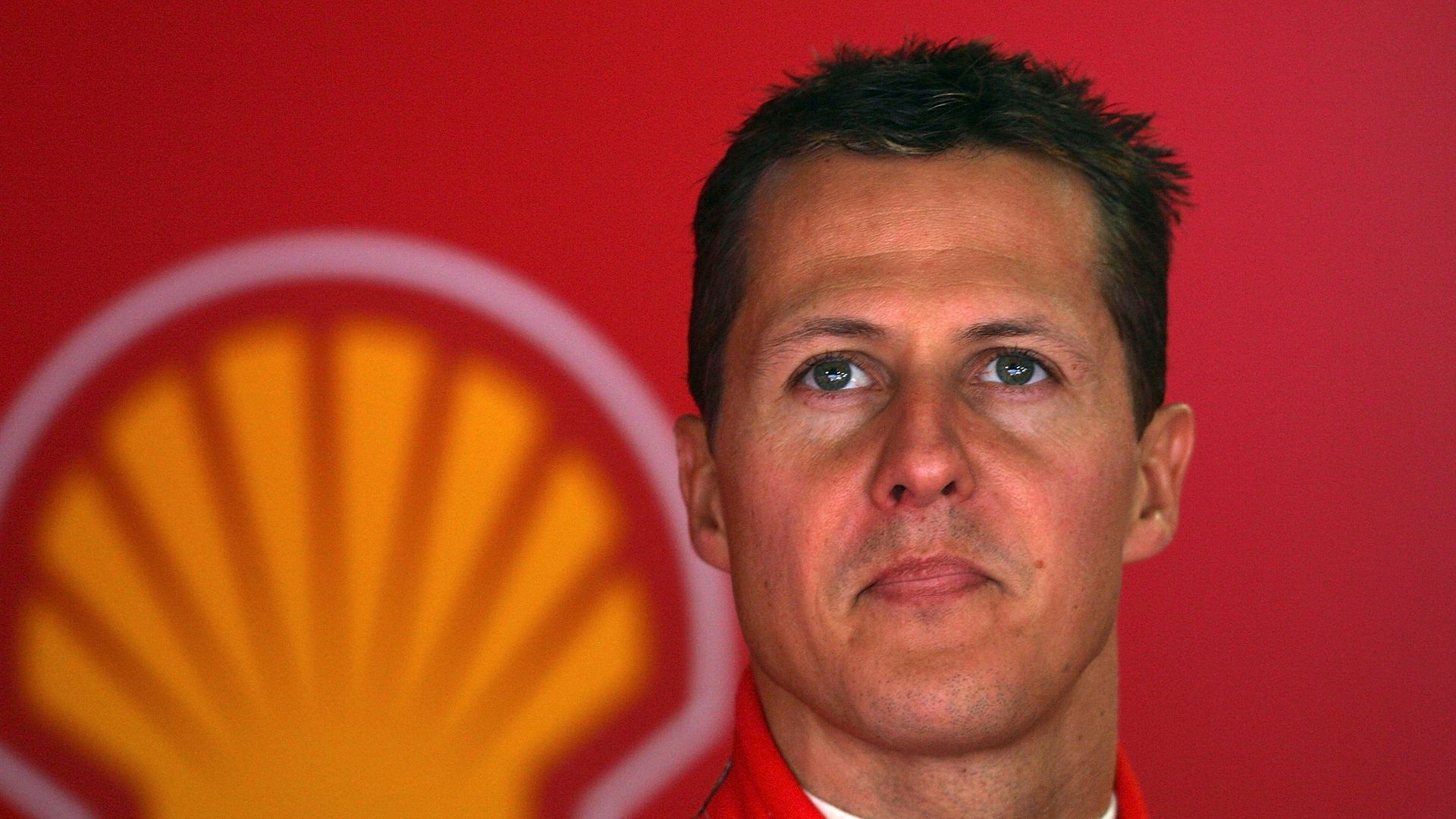 Michael Schumacher of Germany and Ferrari looks on in the Ferrari pit during the qualifying session for the Monaco Formula One Grand Prix on May 22, 2005 in Monte Carlo, Monaco
