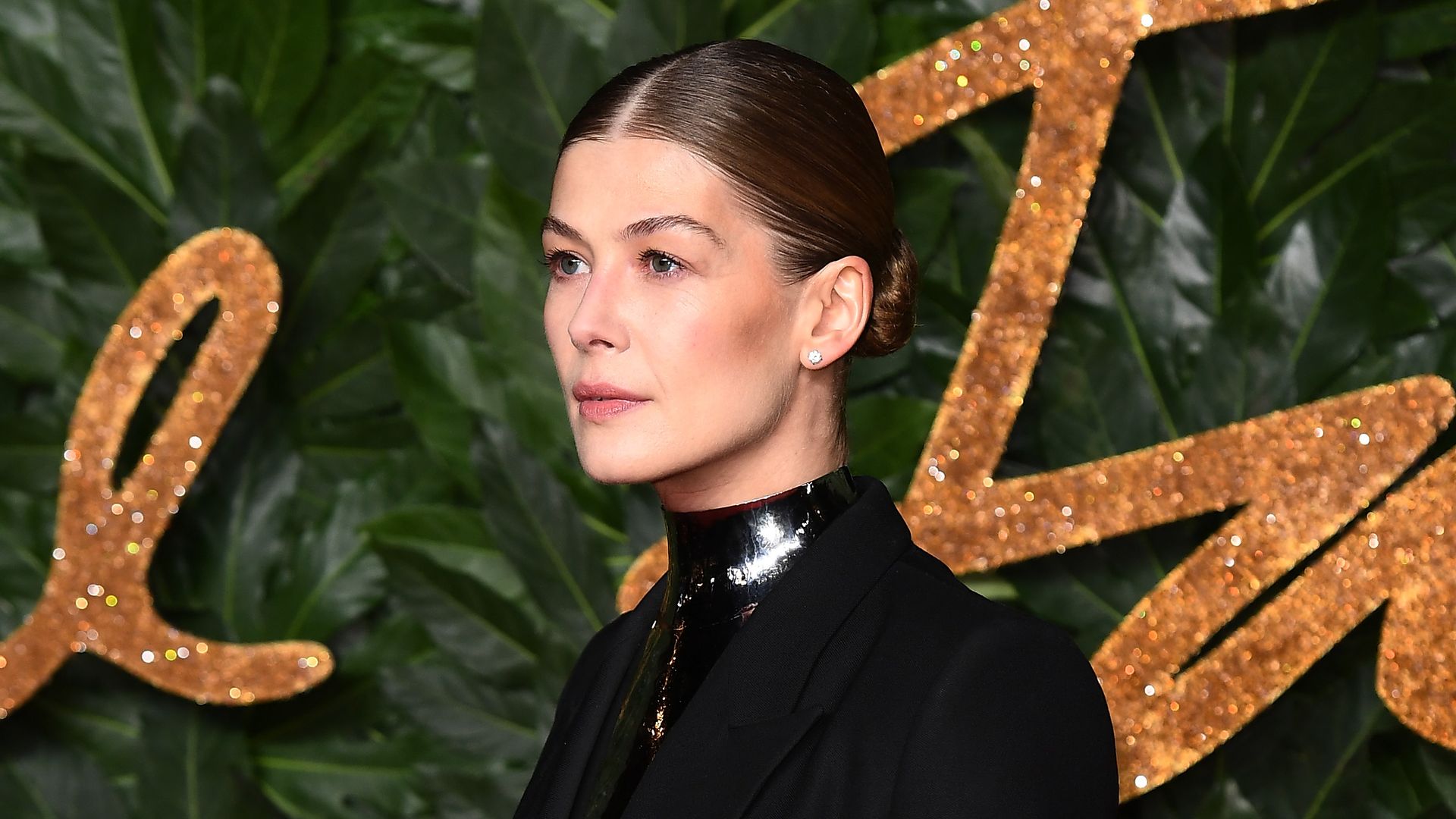 Rosamund Pike arrives at The Fashion Awards 2018 In Partnership With Swarovski at Royal Albert Hall on December 10, 2018 in London, England