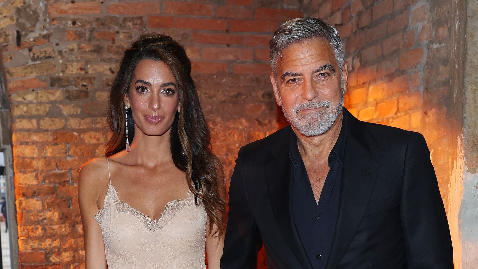 Amal Clooney and George Clooney attend the DVF Awards 2023 