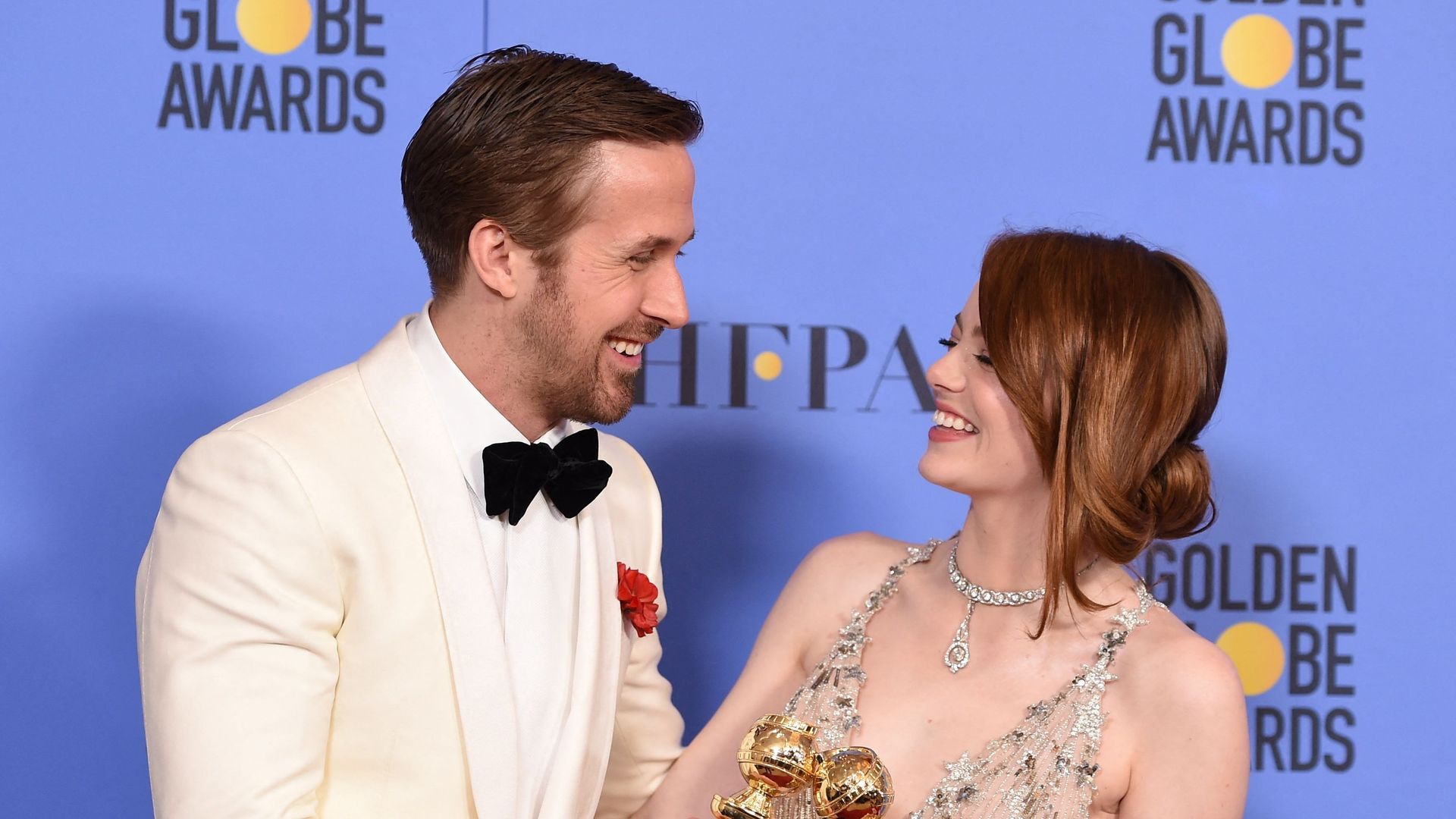Ryan Gosling and Emma Stone pose in the press room at the 74th Annual Golden Globe Awards held at the Beverly Hilton Hotel on January 8, 2017