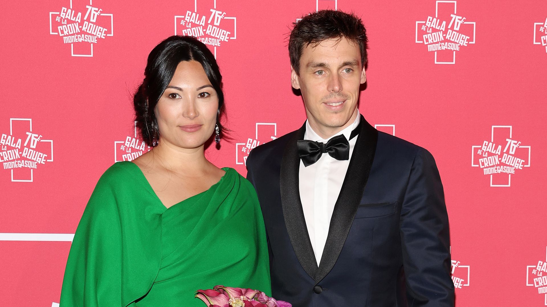 Marie Ducruet in a green dress and Louis Ducruet in a black tuxedo