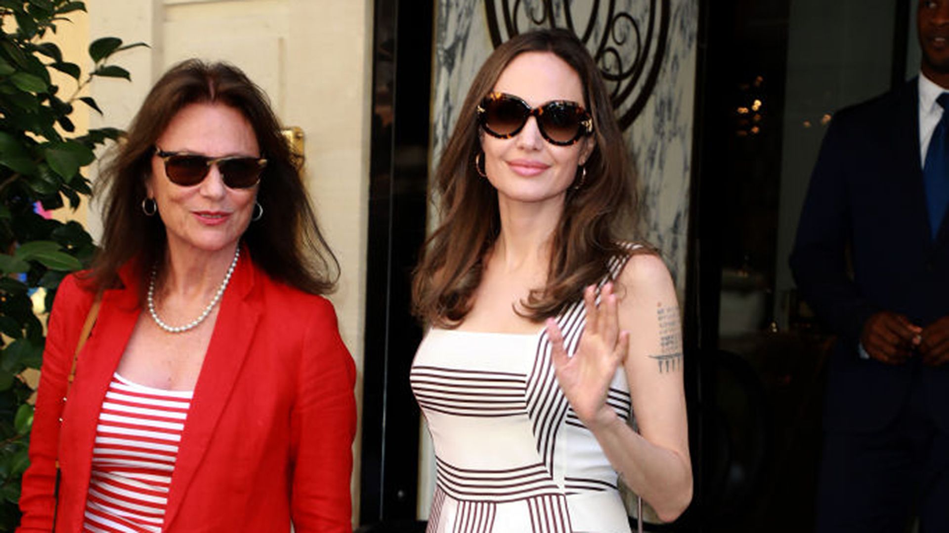 Angelina Jolie and Jacqueline Bisset pose for a photo in Paris, 2019. 
