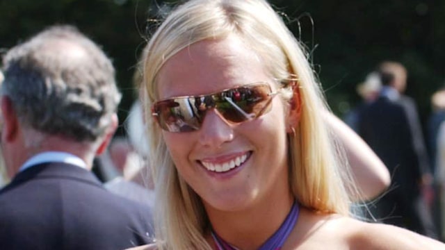 Zara Tindall in a pink geometric dress and sunglasses