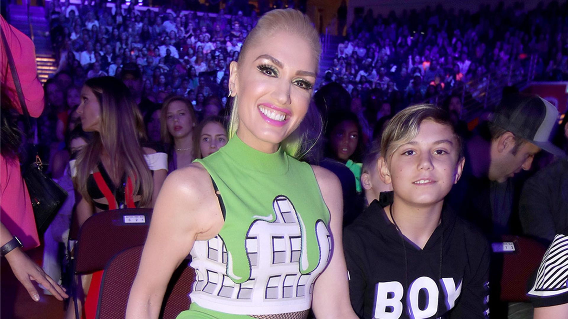 gwen stefani and son kingston at event wearing green