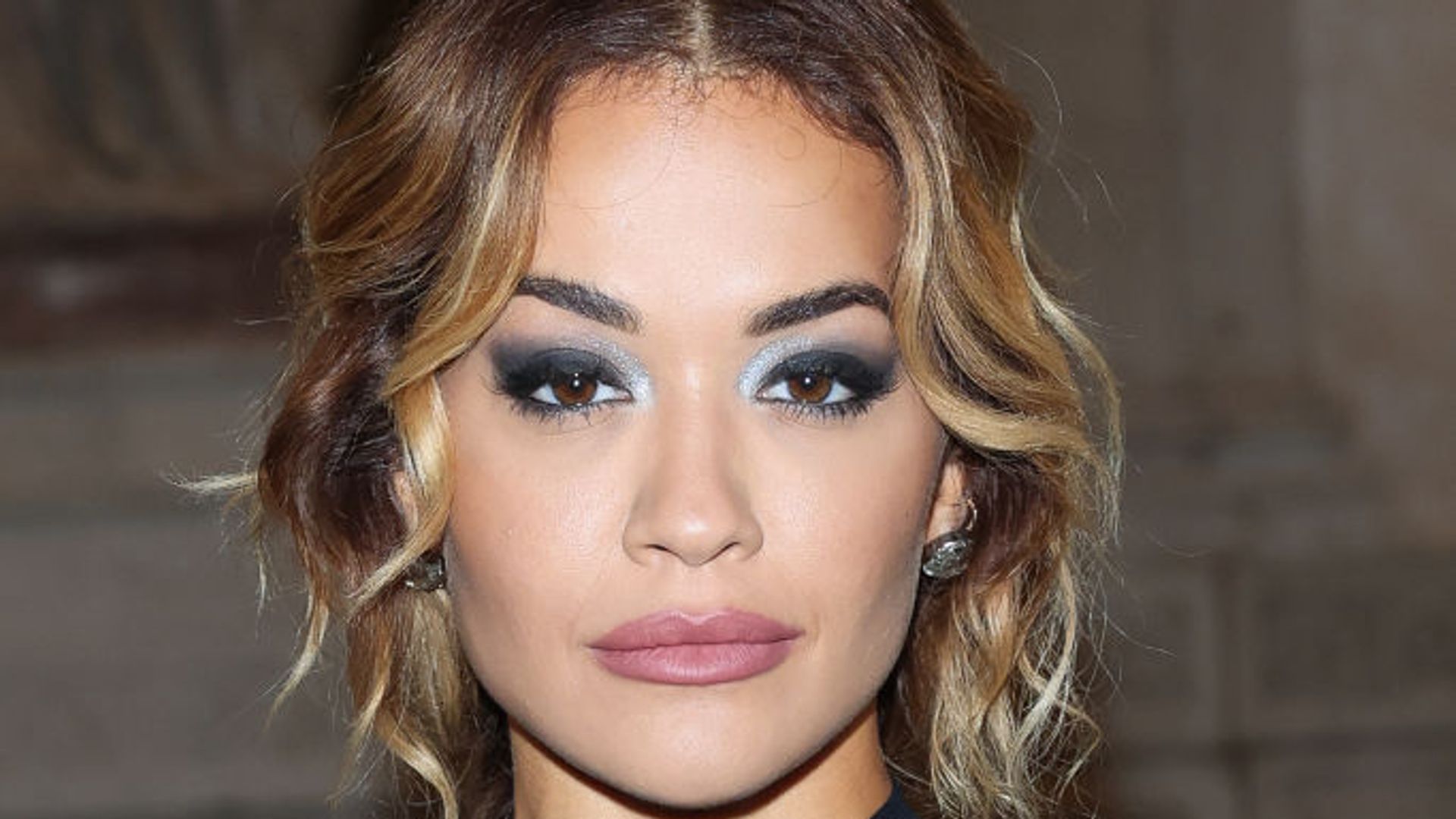 Rita Ora is the latest star to nail the slicked-back bun - and wow