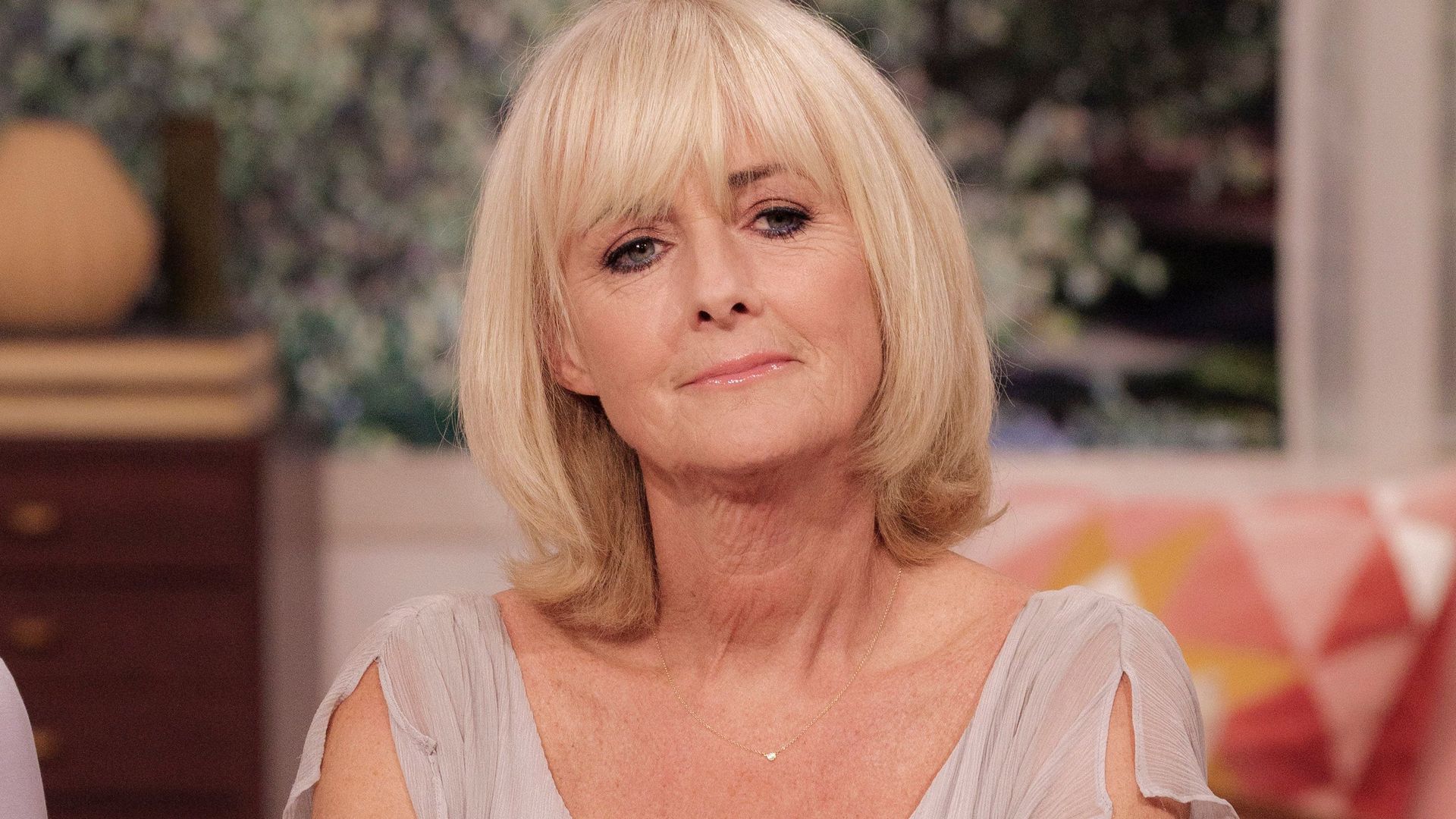 Jane Moore swaps engagement ring for modern diamond two years after split