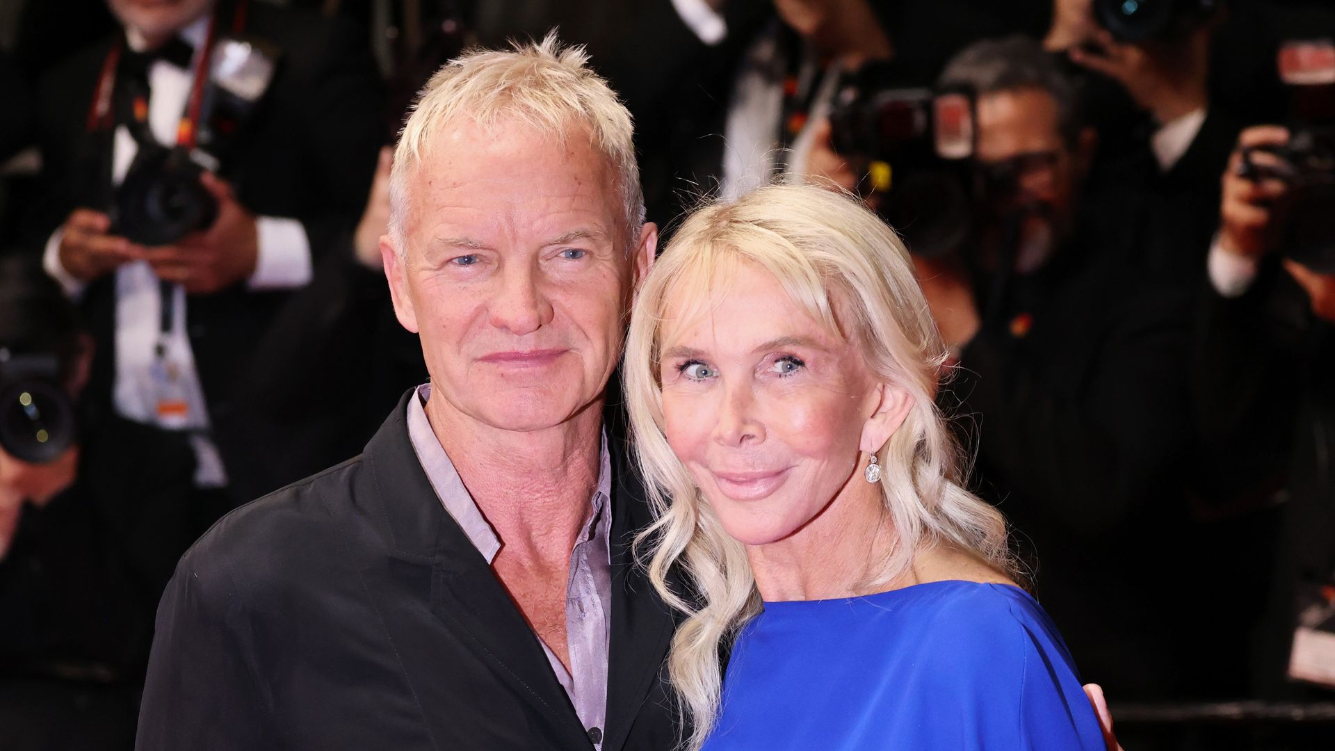 Sting and gorgeous wife Trudie Styler look besotted during affectionate display on Cannes red carpet