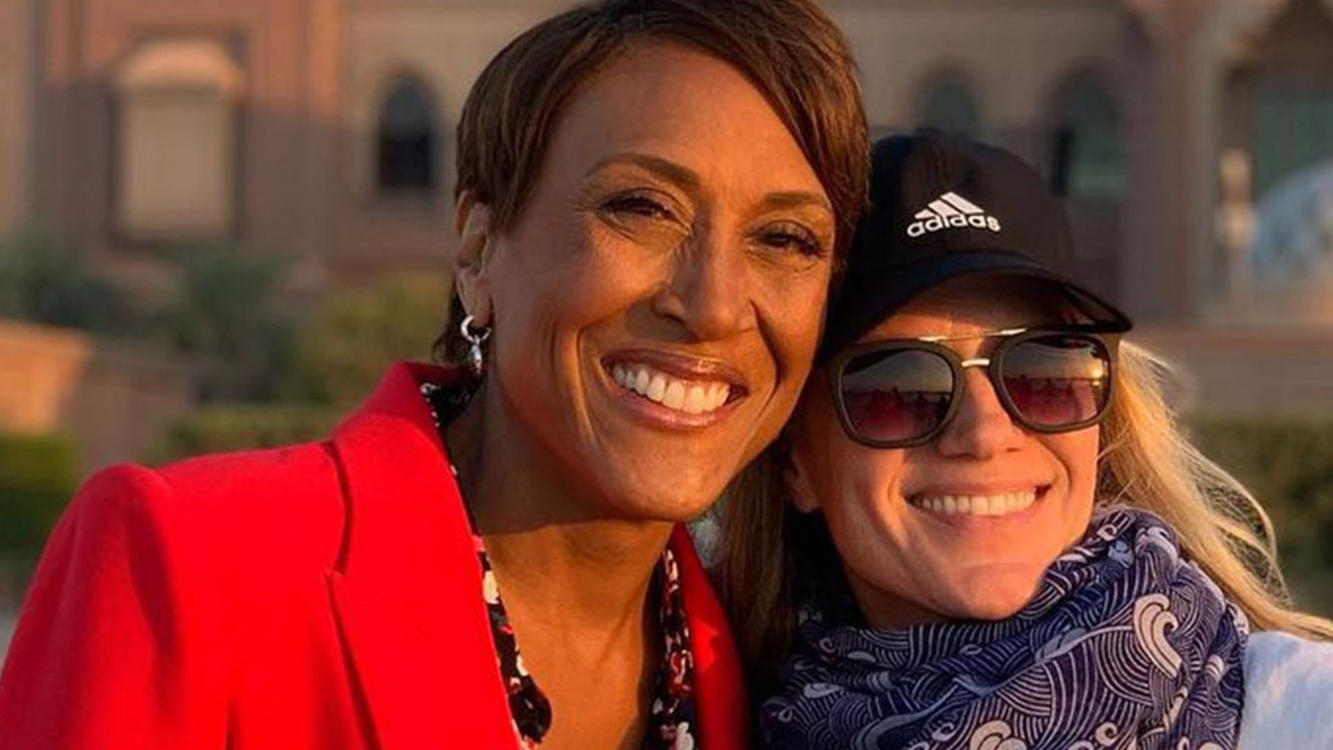 robin roberts with amber laign outside