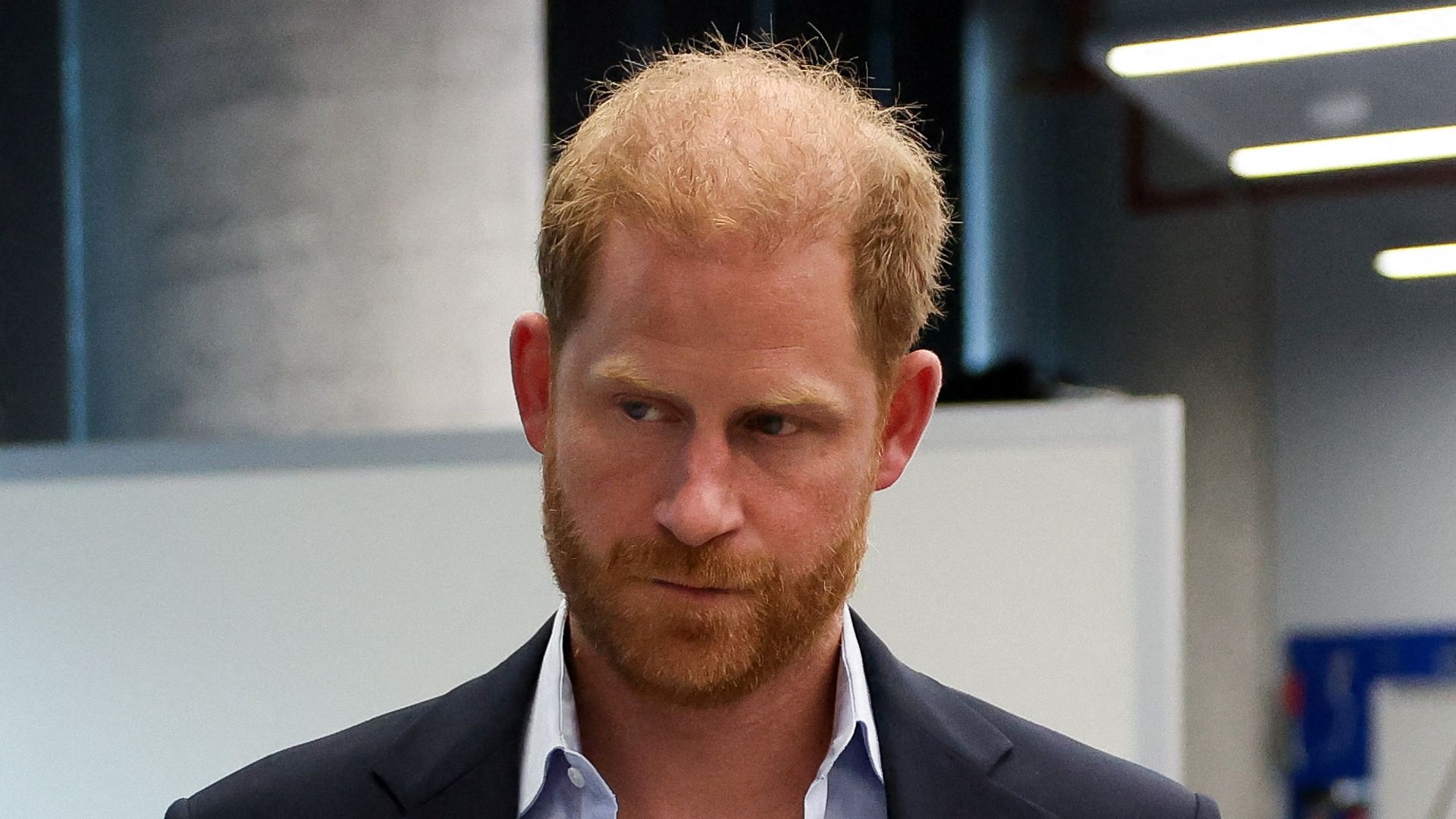 Prince Harry looking serious during an engagement whilst in London