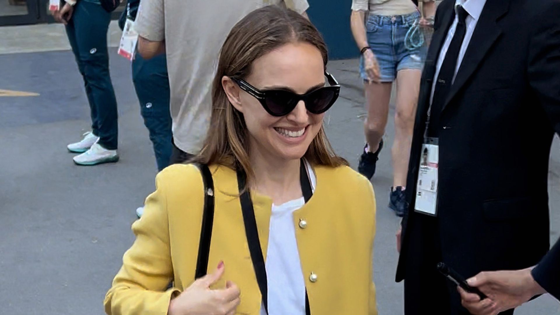 Natalie Portman’s Dior mini skirt and trainers look is completely cool-girl coded