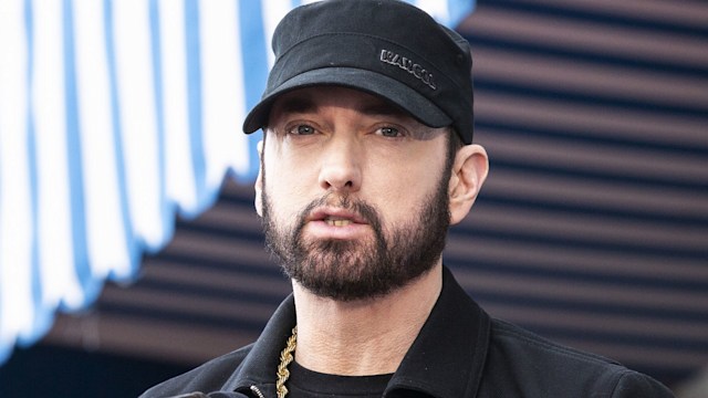 Eminem in a black cap