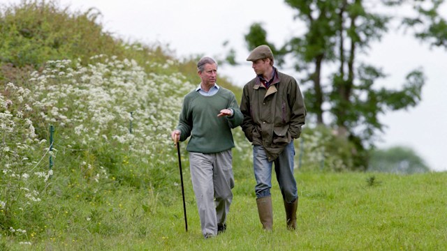 King Charles and Prince William hiking outside