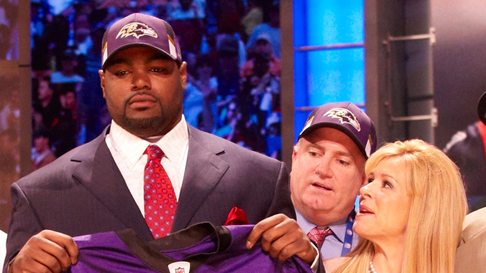 NFL Draft: Baltimore Ravens OT and No 23 overall pick Michael Oher victorious with family.