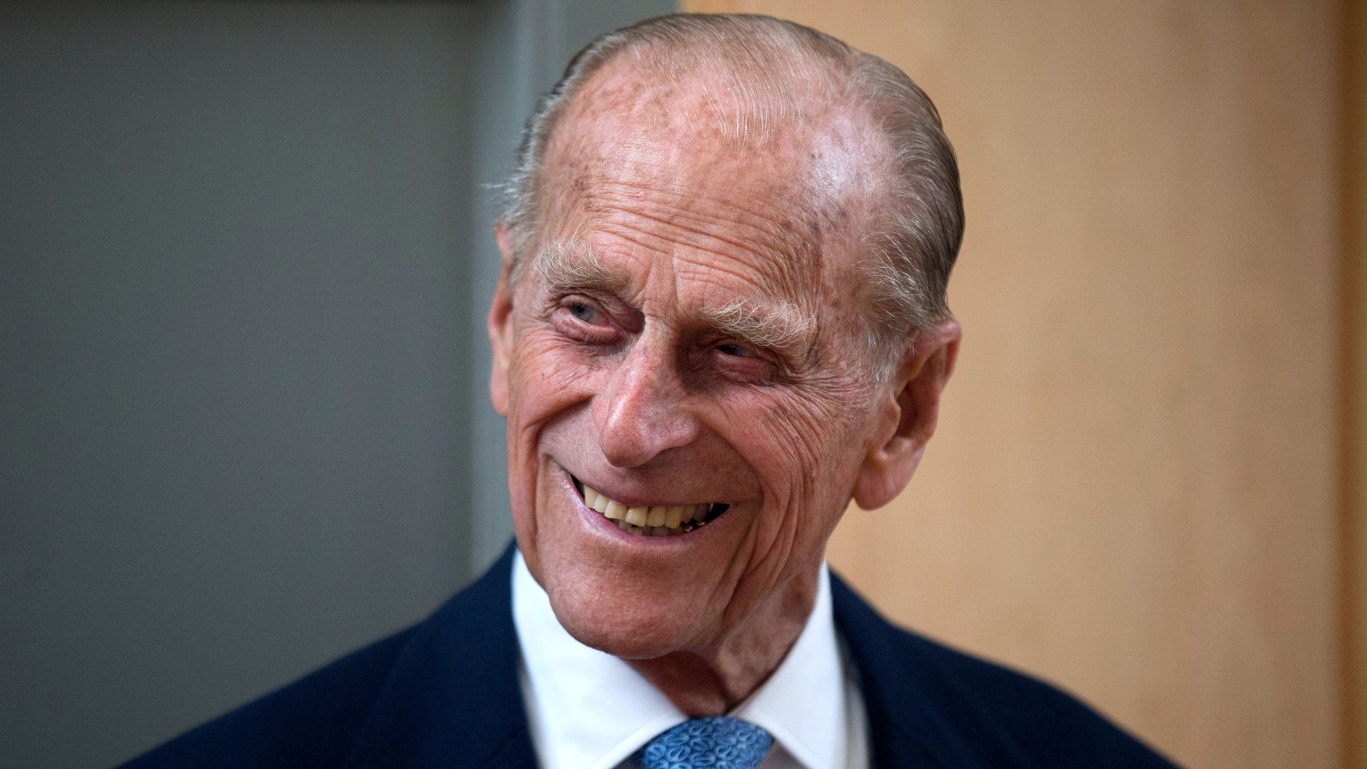 Prince Philip smiling and looking to the left