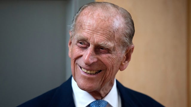 Prince Philip smiling and looking to the left