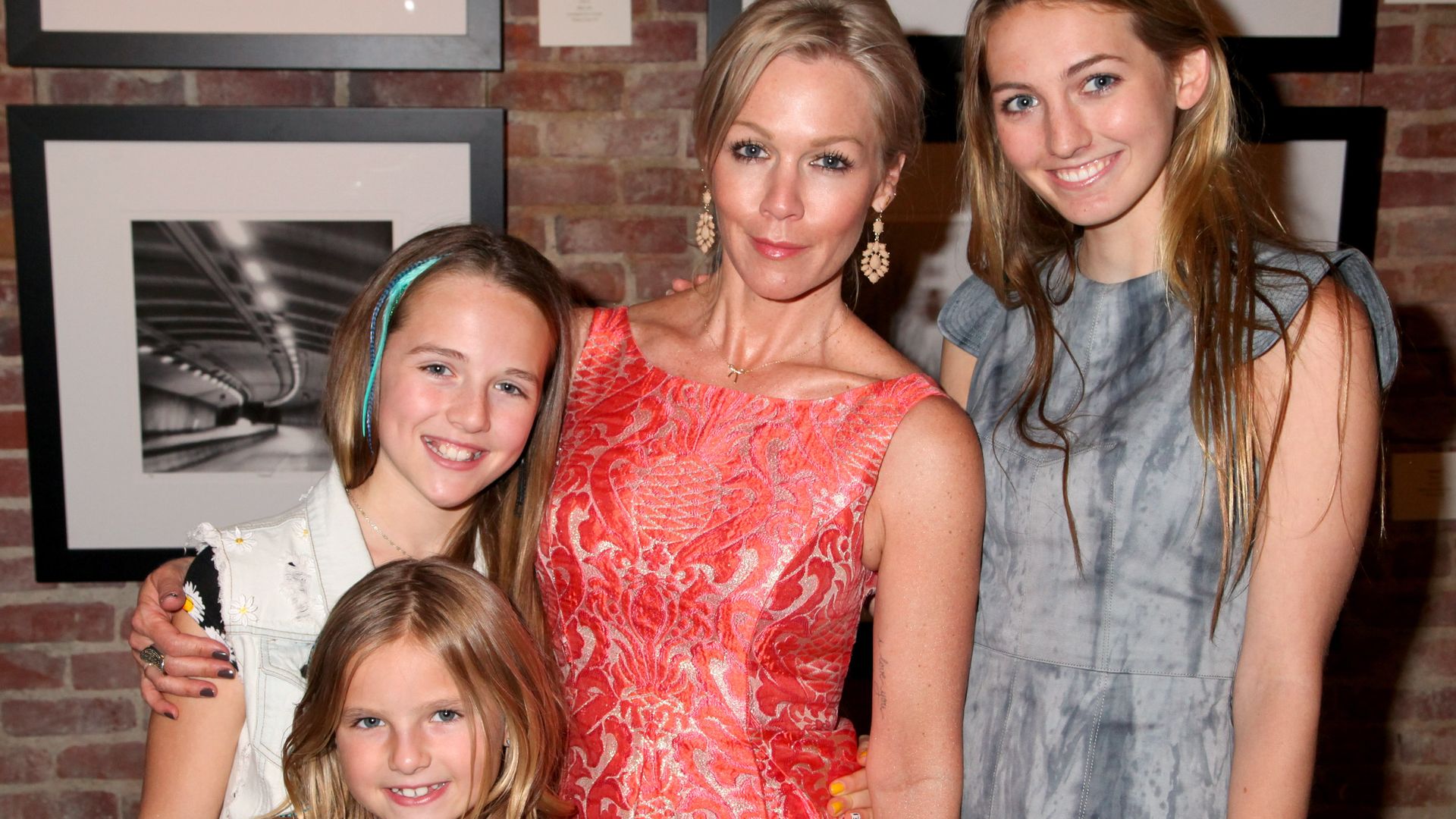 Jennie Garth and daughters (L-R) Lola Ray Facinelli, Luca Bella Facinelli and (foreground) Fiona Eve Facinelli attend the "Jennie Garth: Awake" opening night artist reception at Project Gallery on April 5, 2014 in Hollywood, California