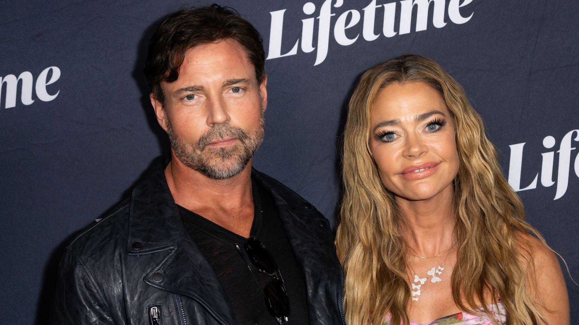 Aaron Phypers and Denise Richards at the Terry McMillan Presents: "Tempted by Love" Los Angeles Premiere held at the IPIC Theaters on August 8, 2024 in Westwood, California