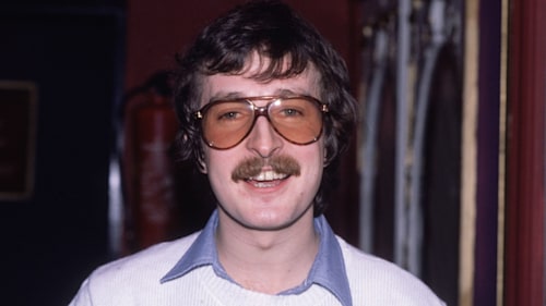 Steve Wright in sunglasses and white jumper