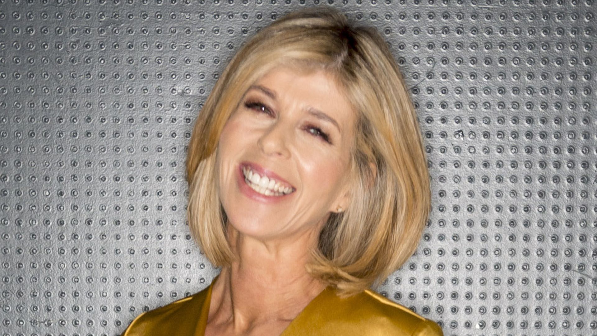 Kate Garraway surprises in flirty satin mini dress and looks