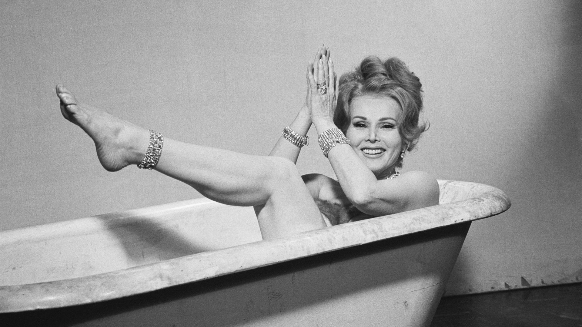 (Original Caption) 2/15/1966-Hollywood, CA- Zsa Zsa Gabor, who replaced Hedy Lamarr in Picture Mommy Dead, clowns in a bathtub on the set of that picture here 2/14. Miss Gabor has just finished her final scenes when she met the UPI photographer. "You fell